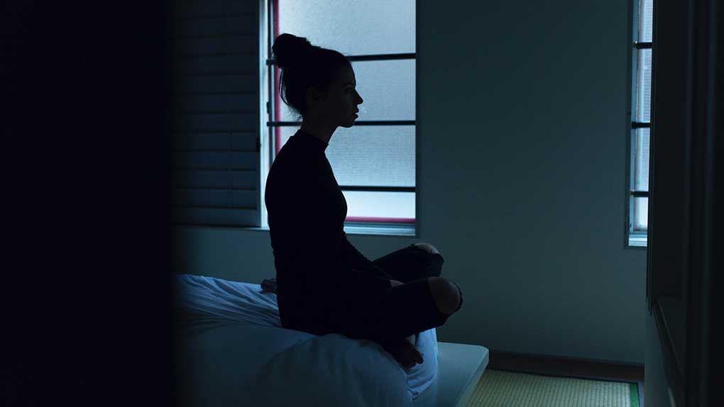Woman struggling to sleep