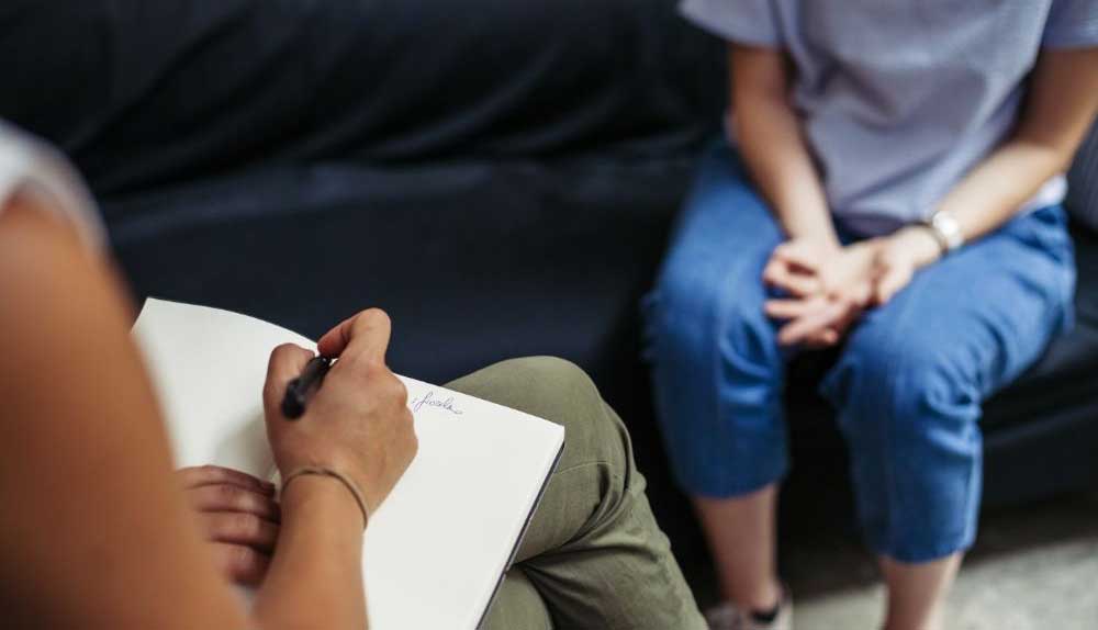 Two people in a therapy session
